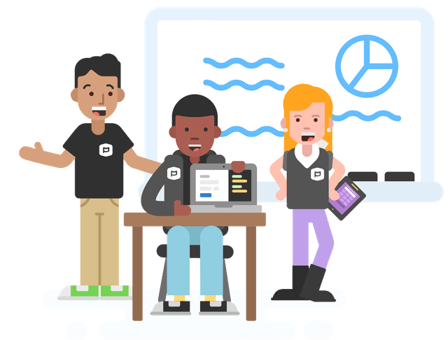 Smiling man sitting at a desk with an open laptop facing away from him.